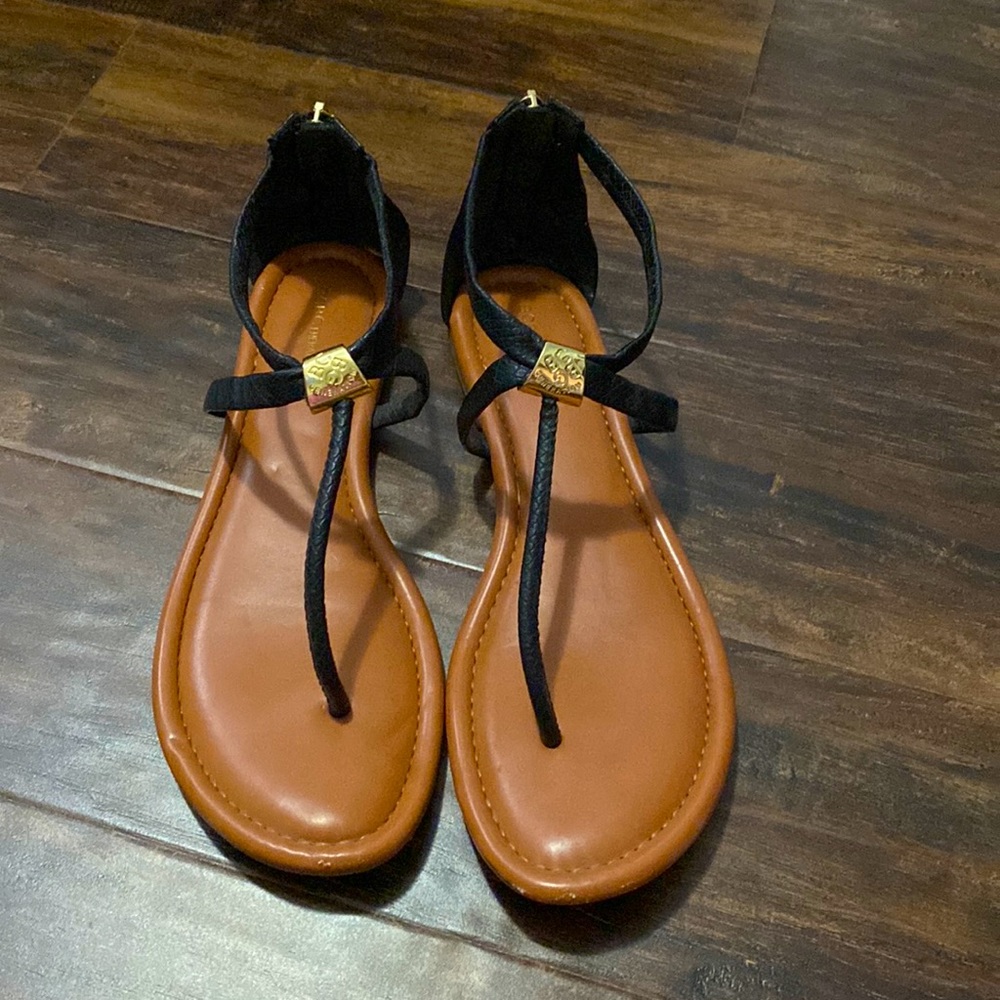 BCBGeneration, size 9 1/2, sandal. Black with gold detailing and zipper.